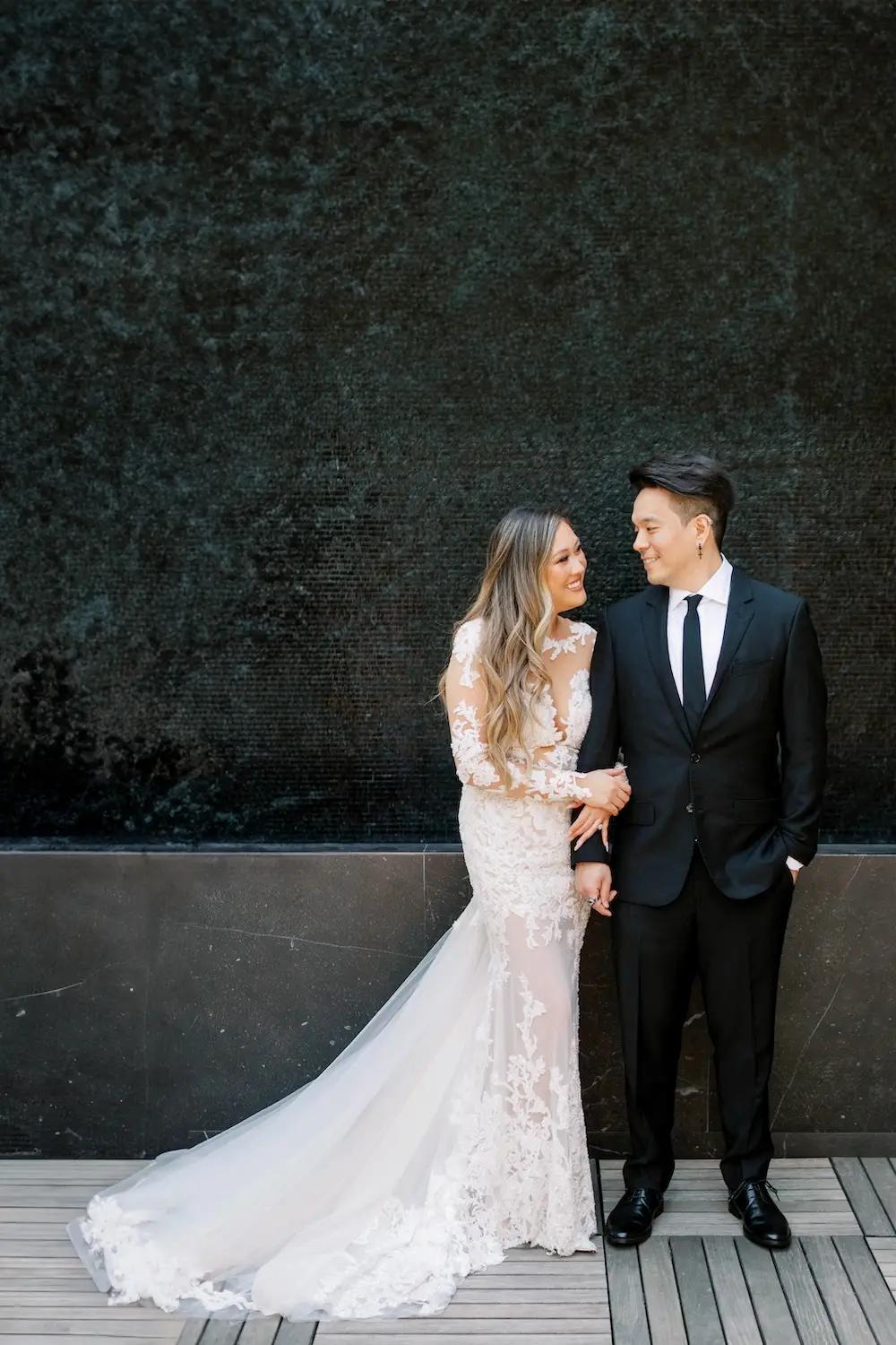 Cassie Wears Long Sleeves, Illusion Lace Wedding Dress. Mobile Image