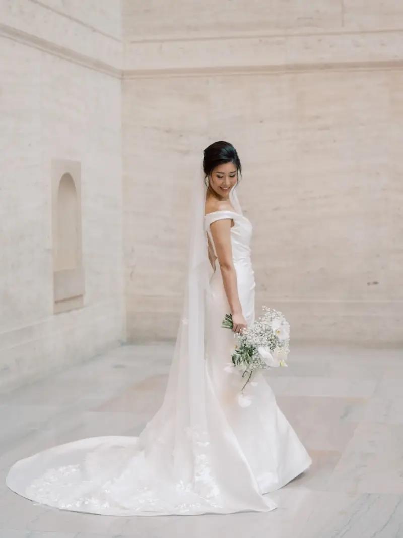 Sophia Wears Off The Shoulders, Minimalist Wedding Dress for Chicago Wedding. Desktop Image