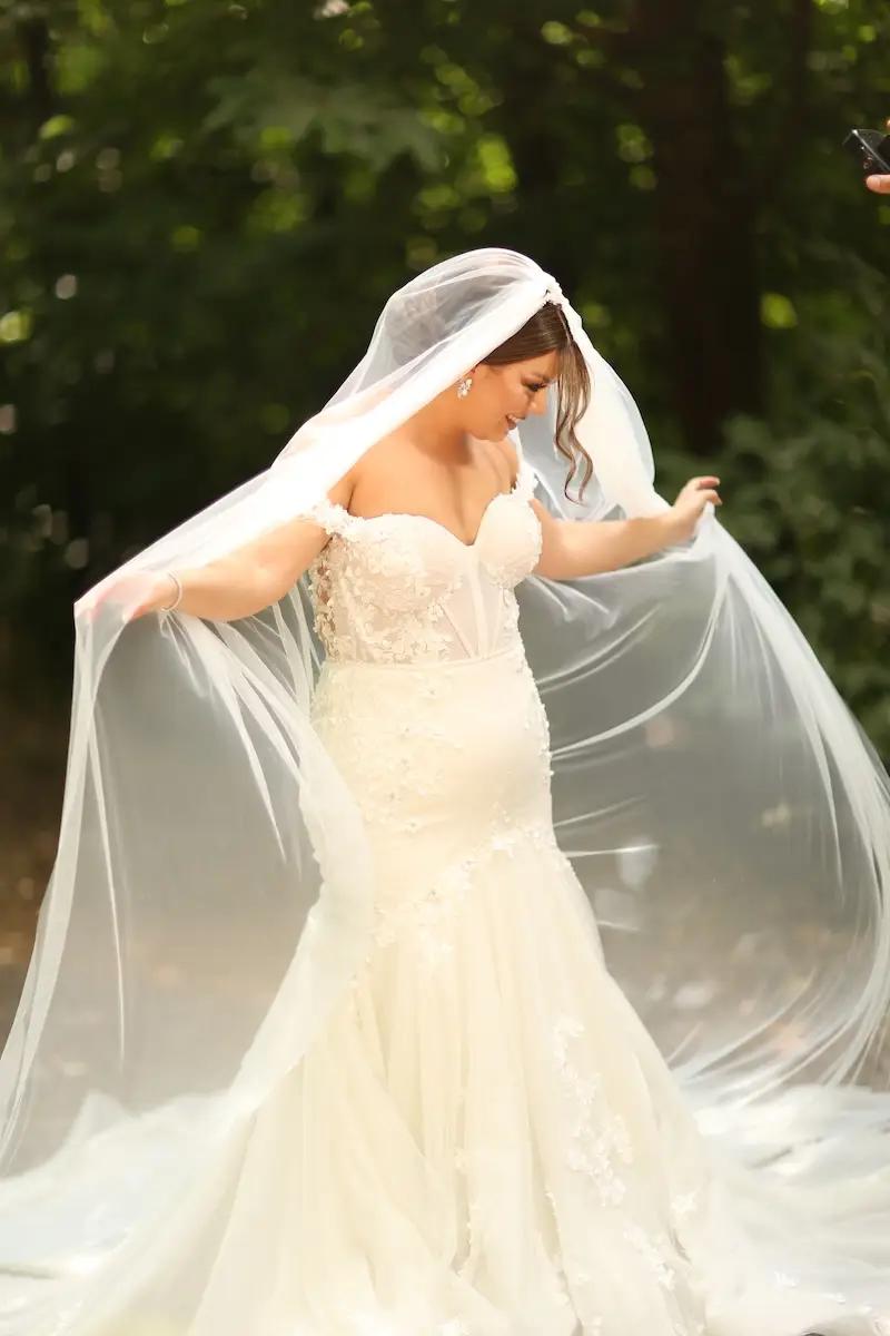 Norma Wears Off the Shoulders, Floral Appliques Wedding Dress. Desktop Image