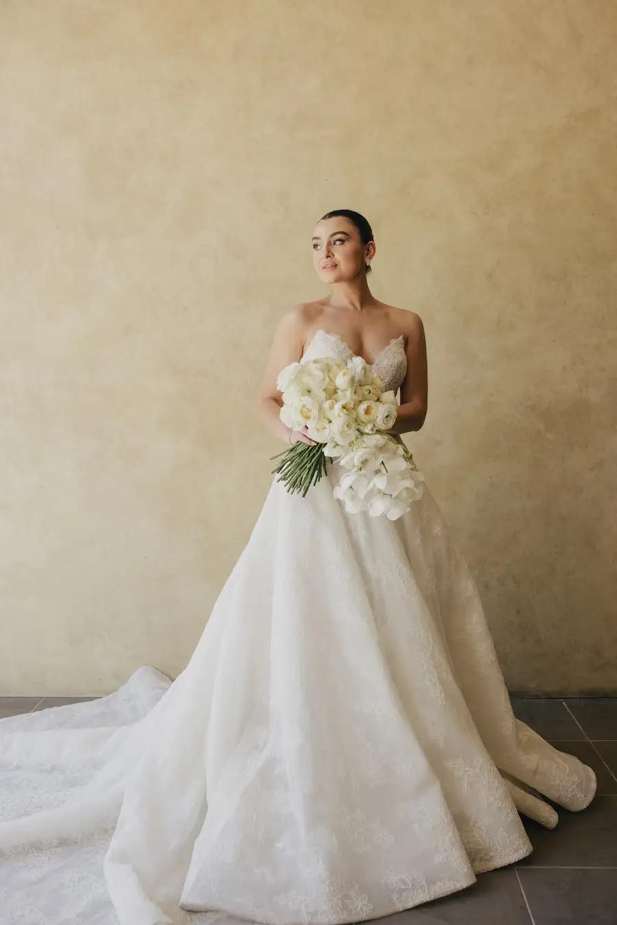 Georgette Wears Floral Lace Strapless Ball Gown Wedding Dress. Mobile Image