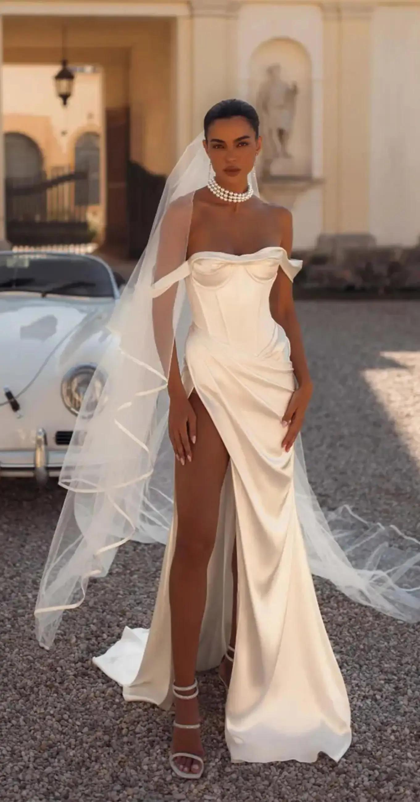 Model wearing a Berta Privee Gown